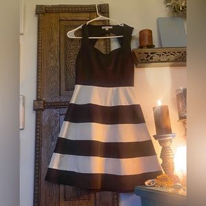 Black and white striped fit and flair dress.